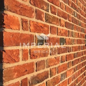 Corner of a wall built using Regency Chesham Multi bricks, laid in flemish bond.